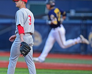 KENT, OHIO - APRIL 13, 2016: Pitcher Joel Hake #3 of YSU shows his frustration after Dylan Rosa #28 of Kent State hit a solo home run in the bottom of the 6th inning during Wednesday nights game at Schooner Stadium. DAVID DERMER | THE VINDICATOR