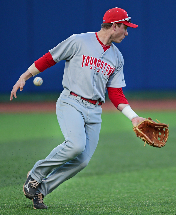 KENT, OHIO - APRIL 13, 2016: Left fielder Alex Larivee #19 of YSU looks for the baseball after it popped out of his glove allowing the Kent State base runner to reach safely in the bottom of the 6th inning during Wednesday nights game at Schooner Stadium. DAVID DERMER | THE VINDICATOR