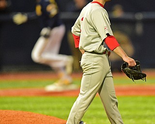 KENT, OHIO - APRIL 13, 2016: Pitcher Joel Hake #3 of YSU shows his frustration after allowing a two run home hun to Zarley Zalewski #9 of Kent State in the bottom of the 7th inning during Wednesday nights game at Schooner Stadium. DAVID DERMER | THE VINDICATOR