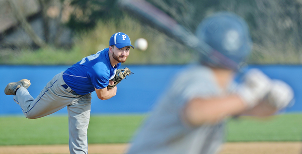 Jeff Lange | The Vindicator  MONDAY, APRIL 18, 2016 - Poland winning pitcher Mike Maillis watches his pitch to an Austintown Fitch batter early in Monday afternoon's game at Poland High School. The Bulldogs downed the Falcons 13-1 in four and a half innings.