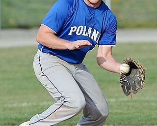 Jeff Lange | The Vindicator  MONDAY, APRIL 18, 2016 - Poland third baseman Dan Klase fields a ground ball in the fourth inning of Monday's game against Austintown Fitch at Poland High School.