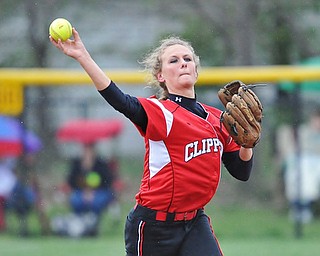 Jeff Lange | The Vindicator  THU, APRIL 21, 2016 - Columbiana shortstop Haley Tohm looks to make a throw to first base in the rain during the first inning of the Clippers' game at South Range High School Thursday afternoon.