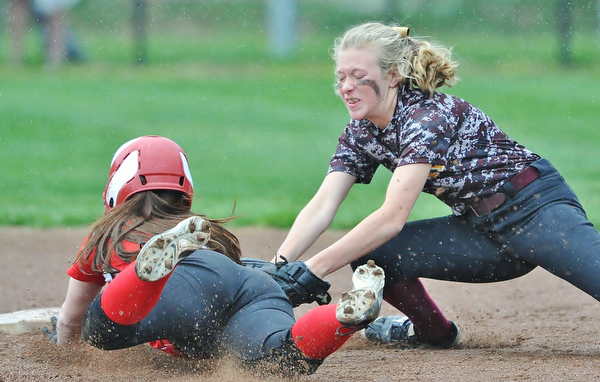 Jeff Lange | The Vindicator  THU, APRIL 21, 2016 - South Range shortstop Codi Taylor (right) puts the tag on Clippers' baserunner Kennedy Fullum as she dives to second base in the second inning of Thursday afternoon's game at South Range High School. South Range edged Columbiana 1-0.