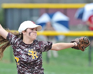 Jeff Lange | The Vindicator  THU, APRIL 21, 2016 - Winning pitcher Caragyn Yanek of South Range delivers a pitch to a Columbiana batter in the rain during the third inning of Thursday's game at South Range High School.