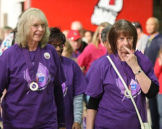William D Lewis the Vindicator Cancer survivors and isters Helen Emery, left, of Bristol and Violet Stinedurf of Howland walk in the YSU Relay for Life 4-15-16 at YSU.