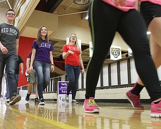 William D Lewis the Vindicator YSU students from left:dam Seidler of Girard, Jennifer Miller of McDonald and Samantha Mock of Hubbard participate in YSU Relay For Life 4-25-26.