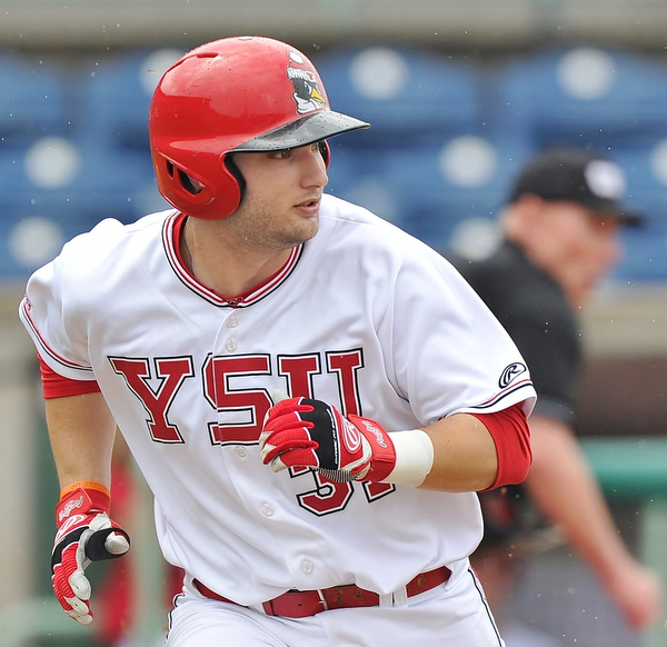 Jeff Lange | The Vindicator  FRI, APRIL 22, 2016 - YSU's Gerrard Rohan watches his hit up the middle as he sprints to first in the third inning of Friday's game against Wright State in Niles.