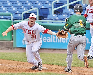 Jeff Lange | The Vindicator  FRI, APRIL 22, 2016 - YSU first baseman Gerrard Rohan (31) catches the ball in time to force out Wright State batter Mitch Roman (4) in the eighth inning of Friday's game in Niles.