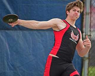 AUSTINTOWN, OHIO - APRIL 23, 2016: Ian Kristan of Canfield throws the discus during the boy's discus during the 103rd Annual Mahoning County Track & Field Championships. DAVID DERMER | THE VINDICATOR