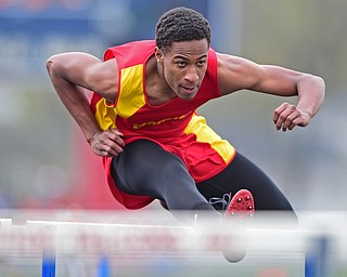 AUSTINTOWN, OHIO - APRIL 23, 2016: Ron Casey of Mooney clears a hurdle during his flight of the boys 110 meter hurdles during the 103rd Annual Mahoning County Track & Field Championships. DAVID DERMER | THE VINDICATOR