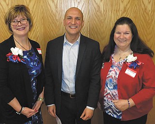 SPECIAL TO THE VINDICATOR
The GFWC Ohio Austintown Junior Women’s League recently hosted the Northeast District Legislation Day. Guest speaker, state Sen. Joe Schiavoni of Boardman, D-33rd, spoke on the importance of education and partnering with local schools. During the meeting, Esther Gartland, GFWC Ohio NED president, presented various clubs with awards and certificates for volunteer services. Above, Schiavoni, center, stands with Marie Dockry, left, AJWL first vice president, and Peggy Bennett, the chapter’s second vice president. More photos of the event and information about AJWL can be found at its website, www.facebook.com/AJWL2014.