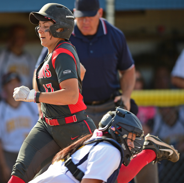 KENT, OHIO - APRIL 27, 2016: Miranda Castiglione #17 of YSU crosses home plate to score a run in the first inning of game two Wednesday night at the Diamond at Dix. Kent State won game two 3-2. DAVID DERMER | THE VINDICATOR..Brooke Dodson #30 of Kent State pictured. .