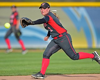 KENT, OHIO - APRIL 27, 2016: Brittney Moffatt #2 of YSU reaches for the ball in an attempt to keep it from going into center field for a Kent State base by Emily Dobbin in the fifth inning of game two Wednesday night at the Diamond at Dix. Kent State won game two 3-2. DAVID DERMER | THE VINDICATOR