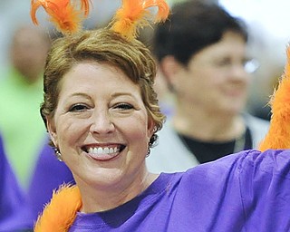Jeff Lange | The Vindicator  FRI, APRIL 29, 2016 - Ten month leukemia surivor Sarah D'Errico of Niles dances as she walks in the Niles Relay For Life Friday evening at Infante Wellness Center.