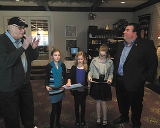 SPECIAL TO THE VINDICATOR
The Austintown Optimist Club honored winners of its Respect for Law poster contest April 12 at the Saxon Club. The theme of the contest was “Police are my Heroes,” and was open to all Austintown Intermediate School students. The event was sponsored by the club with the Austintown Police Department and the school. Of 40-plus entries, one winner was chosen from each of grades three through five. The top poster designers were: Third grade, Brenyn Wilson; fourth grade, Ella Holbrook; and fifth grade, Hannah Magress. Involved in the event were Michael Zocali, fourth-grade principal; AIS staff; Robert Gavalier, Austintown police chief; Jeff Toth, Austintown police officer; and committee members Pete Gabriel, chairman; Bill Lowery; Lynn Larson; and Joann Sulenski. Pictured above are, from left, Gabriel, Brenyn, Ella, Hannah and Mahoning County Commissioner Anthony Traficanti.