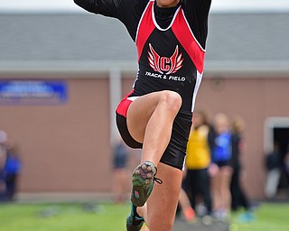 POLAND, OHIO - APRIL 30, 2016: Emily Hrina of Canfield flies through the air during the girls long jump Saturday afternoon during the Poland Invitational at Poland High School. DAVID DERMER | THE VINDICATOR