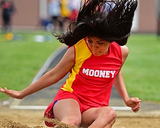 POLAND, OHIO - APRIL 30, 2016: Paolo Cardova of Mooney sticks the landing in the sand during the girls long jump Saturday afternoon during the Poland Invitational at Poland High School. DAVID DERMER | THE VINDICATOR
