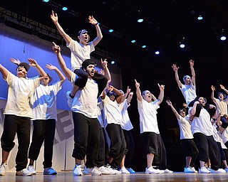 Jeff Lange | The Vindicator  SAT, APRIL 9, 2016 - Members of Youngstown's Sigma Alpha Epsilon perform "Hit 'Em High" by Busta Rhymes during Saturday's The 90s Greeksing event held at Stambaugh Auditorium in Youngstown.