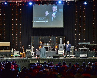 Jeff Lange | The Vindicator  SAT, APRIL 30, 2016 - Youngstown State University President and former head football coach of The Ohio State Buckeyes Jim Tressel speaks to a large crowd about what defines a champion during Saturday's Men's Rally in the Valley held at the Covelli Centre in Youngstown.