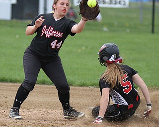 William D Lewis The The Vindicator Canfield's Amy Sammarco (5)  steals 2nd while Jefferson's Maggie Moore(44) waits for the throw during 5/3/16 game at Canfield.