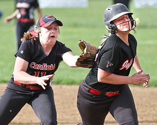 William D. Lewis The Vindicator Canfield's Jill Baker(11) tags Jefferson's Sam Hamski(10) in a run down between 2nd and 1rst during 5/3/16 game at Canfield.