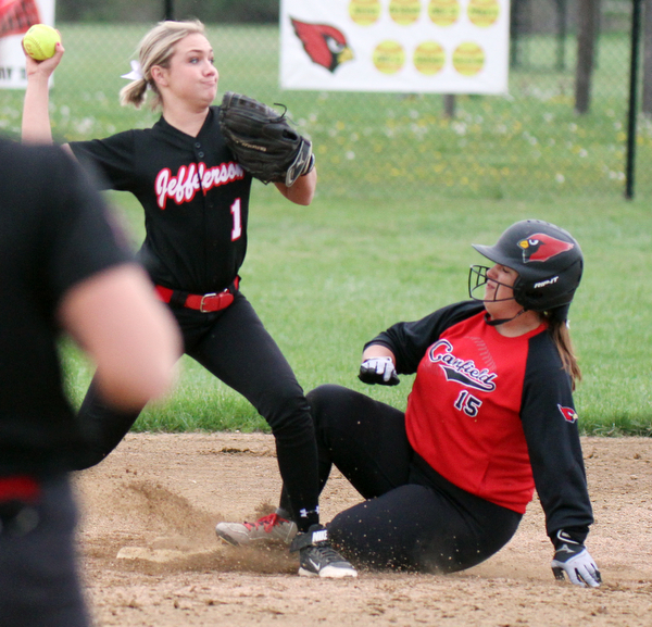 William D. Lewis The Vindicator   Jefferson's Emily Smock(1) makes the throw to 1rst as Canfield's Jenna Gibson (15) is out at 2nd during 6th inning of 5/3/16 game at Canfield.