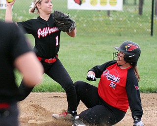 William D. Lewis The Vindicator   Jefferson's Emily Smock(1) makes the throw to 1rst as Canfield's Jenna Gibson (15) is out at 2nd during 6th inning of 5/3/16 game at Canfield.