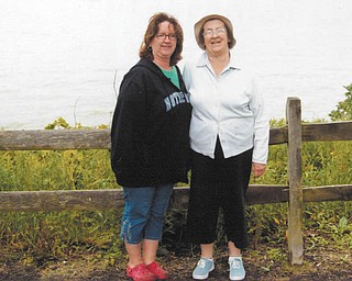 Beth Hull, left, of Youngstown, says her mom, Marie Rubesich of Warren, is simply the best because she raised six children practically on her own that have grown into well-adjusted adults. Hull says her mom often went without things she needed to help her children through the years. Rubesich is 89 now and slowing a little, but her six kids are happy to care for the woman who cared so much for them.