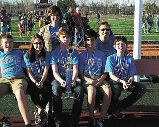 SPECIAL TO THE VINDICATOR
Imagination and creativity has earned Joseph Badger Middle School Destination Imagination team a trip to the Global Finals in May at the University of Tennessee, Knoxville, after their performance at the state finals in Mount Vernon, Ohio, on April 16. They will compete against teams from all over the United States and 15 countries. The team designed, built and tested load-bearing structures of their project, “Musical Mash-Up.” The team needs to raise approximately $775 per student and adult chaperone. To make donations, contact the Badger Middle School PTO, visit gofundme.com/2597ksy4 (search for Badger DI) or call Angela at 330-240-3809. Team members, in front from left, are Logan Murphy, Suzanne Shaffer, Jayden Smith, Jacob Zahoransky and Hunter Hart, and in back are Angela Shaffer, assistant leader; and Angela Murphy, team leader.