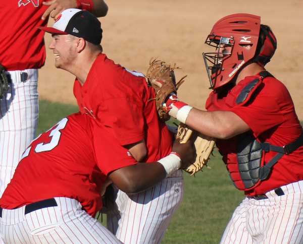 William d Lewis the vindicator Niles pitcher Tyler Srbinovich(13) celebrates with Damion Coleman(23) and catcher Cameron Carson(7) after defeating LAkeview during 5-6-16 game at Eastwood.