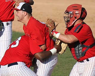 William d Lewis the vindicator Niles pitcher Tyler Srbinovich(13) celebrates with Damion Coleman(23) and catcher Cameron Carson(7) after defeating LAkeview during 5-6-16 game at Eastwood.