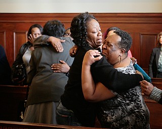   ROBERT K YOSAY | THE VINDICATOR..Family members of the victims react  to the guilty verdict of Austin and Henderson..Michael Austin is clean shaven Hakeem Henderson - red tie beard .A jury today in Mahoning County Common Pleas Court has found Michael Austin, 22, guilty of three counts of murder, one count of murder and engaging in a pattern of corrupt activity..Austin was found not guilty of a separate charge of attempted murder..Hakeem Henderson, 24, was found guilty of two counts of aggravated murder, not guilty of two counts of aggravated murder, and engaging Ina pattern of corrupt activity...--30-