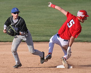 William d Lewis the Vindicator  Nile Nick Limongi(5) is safe at 2nd after LAkeview's (7) was late with the tag during 5-6-16 game at Niles