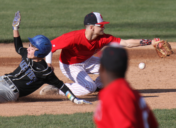 William D Lewis The Vindicator  LAkewview's (1) is safe at 2nd as Niles Geno Barricella(6) looses control of the ball during 5-6-16 game at Niles.