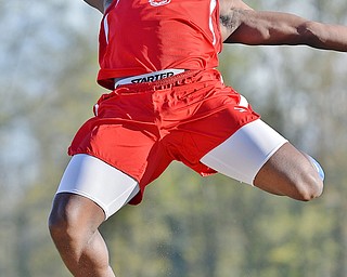 Jeff Lange | The Vindicator  THU, MAY 5, 2016 - Niles' Steven Mintz soars through the air during the boys' long jump event during Thursday's track meet at Lakeview High School.