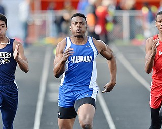 Jeff Lange | The Vindicator  THU, MAY 5, 2016 - Hubbard's George Hill (center) sprints to the finish as Brookfield's Xavier Bailey (left) and Labrae's Tariq Drake trail from behind in the boys 100 meter dash during Thursday's track meet in Cortland.
