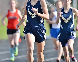Jeff Lange | The Vindicator  THU, MAY 5, 2016 - McDonald's Malina Mitchell leads a pack of competitors in the girls 1600 meter run during Thursday's track meet in Cortland.