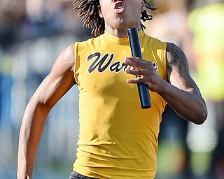 Jeff Lange | The Vindicator  THU, MAY 5, 2016 - Warren Harding's Kayron Adams sprints to the finish line in the boys 4x100 meter relay during Thursday's track meet in Cortland.