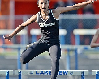 Jeff Lange | The Vindicator  THU, MAY 5, 2016 - Harding's Gariana Bercheni clears a hurdle in the girls 300 meter hurdles during Thursday's meet in Cortland.