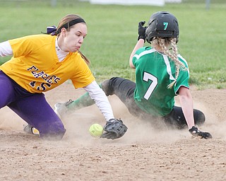 William d Lewis the vindicator WB's Grace Heath(7) is safe at 2nd as Champions Megan Turner(15) looses control of the ball during 5-6-16 game.
