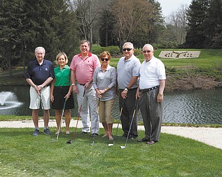 ROBERT K. YOSAY|THE VINDICATOR
Among those preparing for the sixth annual Clubs for Kids Golf Classic are, from left, Paul Dutton, Sallie Dutton, David Tod II, Judy Schmutz, Reid Schmutz and Jim Siser.