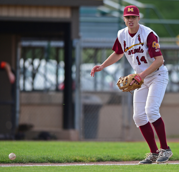 STRUTHERS, OHIO - MAY 10: 2016: Pitcher Jack Lynch #14 of Mooney looks to first base after misplaying the ball and allowing Steve Ranelli #2 of Springfield to reach base in the fifth inning of Tuesday afternoons game at Cene Park. Mooney won 6-3. DAVID DERMER | THE VINDICATOR
