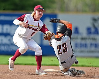 STRUTHERS, OHIO - MAY 10: 2016: Shortstop Bryce Richey #8 of Mooney tags out Anthony Ugolini #23 of Springfield as he attempts to steal second base in the fifth inning of Tuesday afternoons game at Cene Park. Mooney won 6-3. DAVID DERMER | THE VINDICATOR