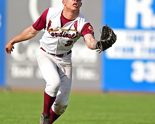 STRUTHERS, OHIO - MAY 10: 2016: Right fielder Devin Curd #2 of Mooney misplays the baseball in the sun allowing it to drop for a base hit in the sixth inning of Tuesday afternoons game at Cene Park. Mooney won 6-3. DAVID DERMER | THE VINDICATOR