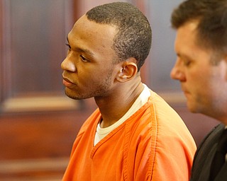   ROBERT K YOSAY | THE VINDICATOR..Michael Austin listens to the judge ..Sentencing of Michael Austin and Hakeem Henderson.The Honorable Judge John DurkinÕs courtroom, Mahoning County Common Pleas Cour.Austin was convicted of four counts of murder; Henderson was convicted of two counts of murder... .--30-