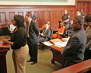   ROBERT K YOSAY | THE VINDICATOR..Victims statements...  are read as Hakeem and Austin listen..Sentencing of Michael Austin and Hakeem Henderson.The Honorable Judge John DurkinÕs courtroom, Mahoning County Common Pleas Cour.Austin was convicted of four counts of murder; Henderson was convicted of two counts of murder... .--30-