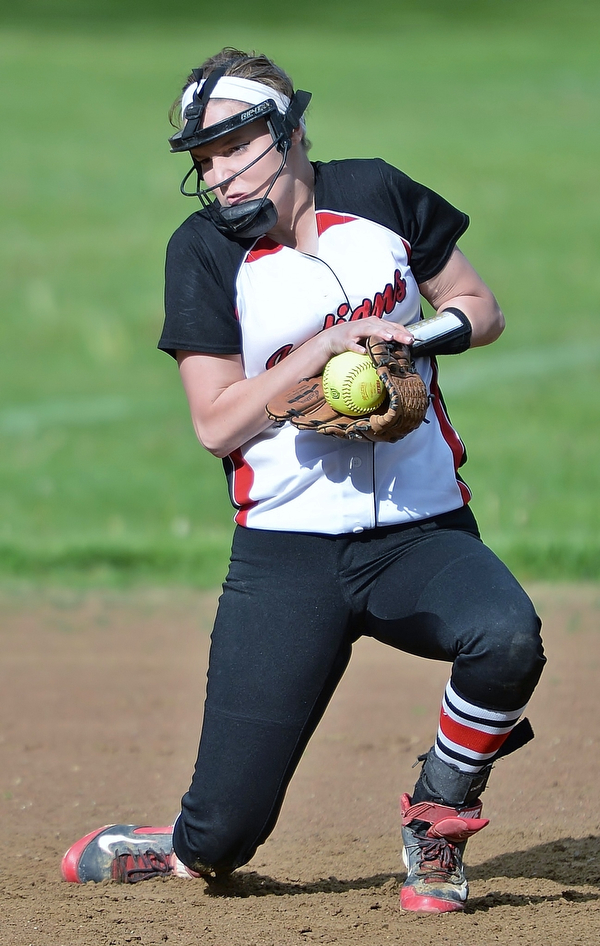 Jeff Lange | The Vindicator WED, MAY 11, 2016 - Girard shortstop Melanie Bakes fields an infield hop in the fourth inning of Girard's softball game at Lakeview High School Wednesday afternoon.