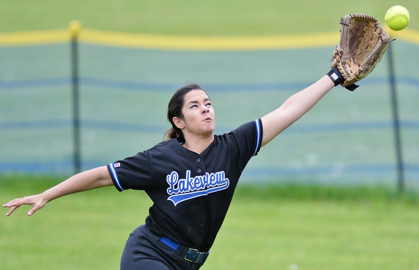 Jeff Lange | The Vindicator WED, MAY 11, 2016 - Lakeview right fielder McKenna Cannon attempts to catch a fly ball in the sixth inning of the Bulldogs' game against Girard at Lakeview High School on Wednesday.