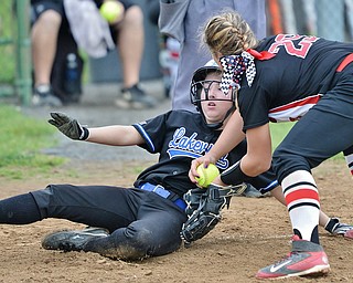 Jeff Lange | The Vindicator WED, MAY 11, 2016 - Lakeview's Madison Buch (left) slides safely home under the tag of Girard's Karlee Byrne in the sixth inning of Wednesday's game at Lakeview High School.