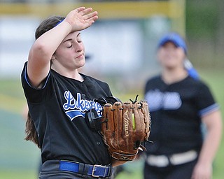 Jeff Lange | The Vindicator WED, MAY 11, 2016 - Lakeview's Cait Kelm wipes the sweat from her brow after Girard scored three runs in the sixth inning of Wednesday's game at Lakeview High School. The Bulldogs defeated Girard 4-3.